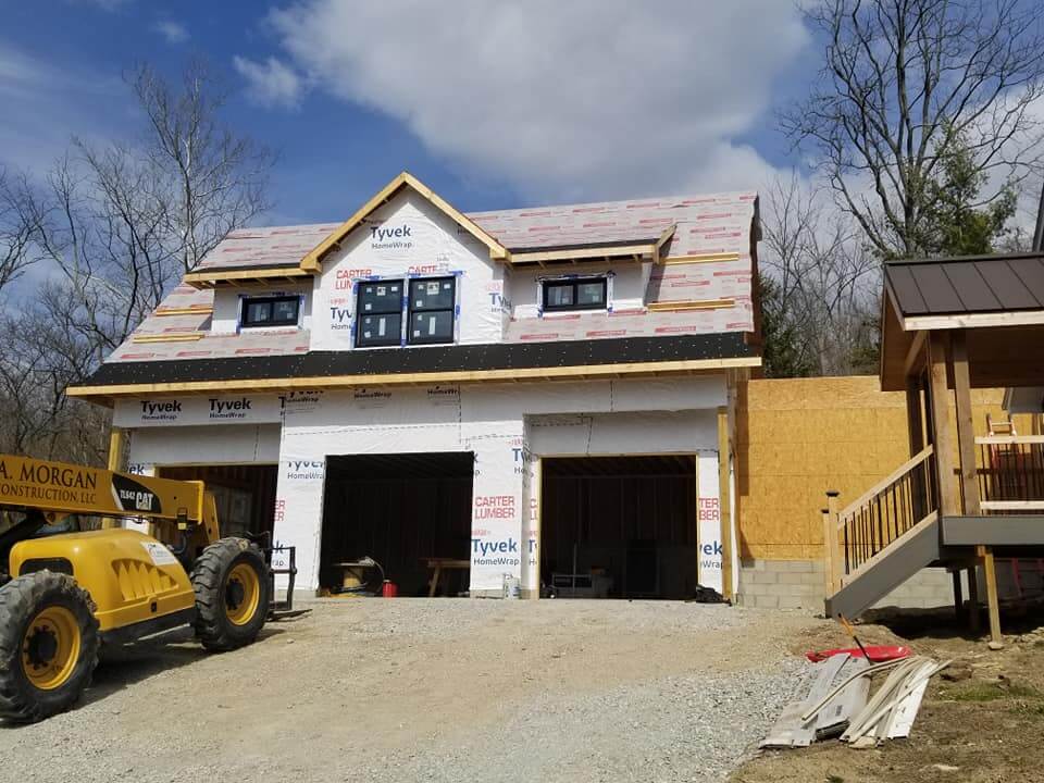 adding a garage to a house